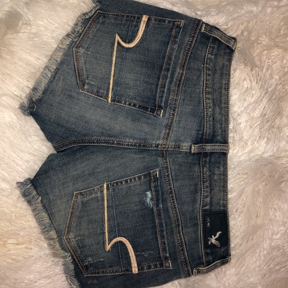 Dark, distressed blue jean shorts - Picture 2 of 2